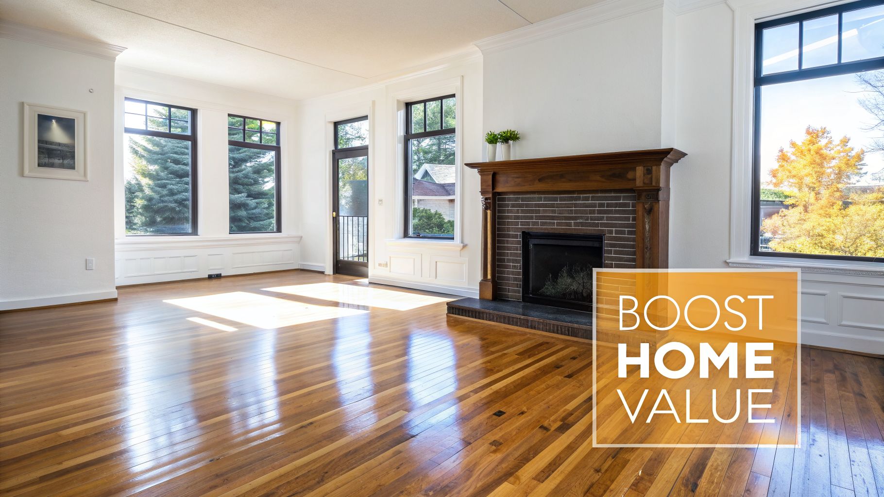 Spacious living room with light hardwood floors, a traditional fireplace, and ample natural light.