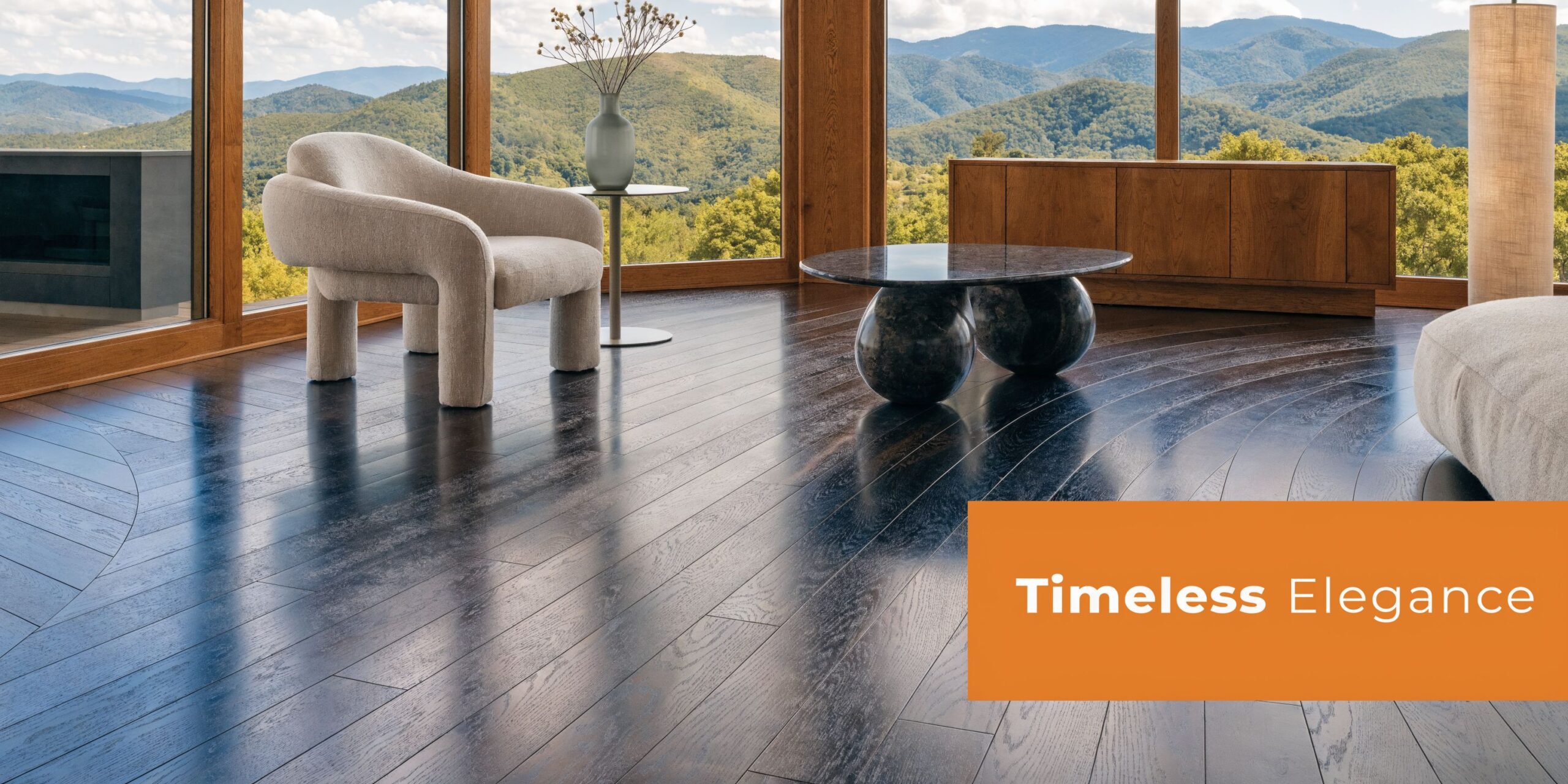 A modern living room featuring dark walnut stain on white oak hardwood flooring with mountain views.