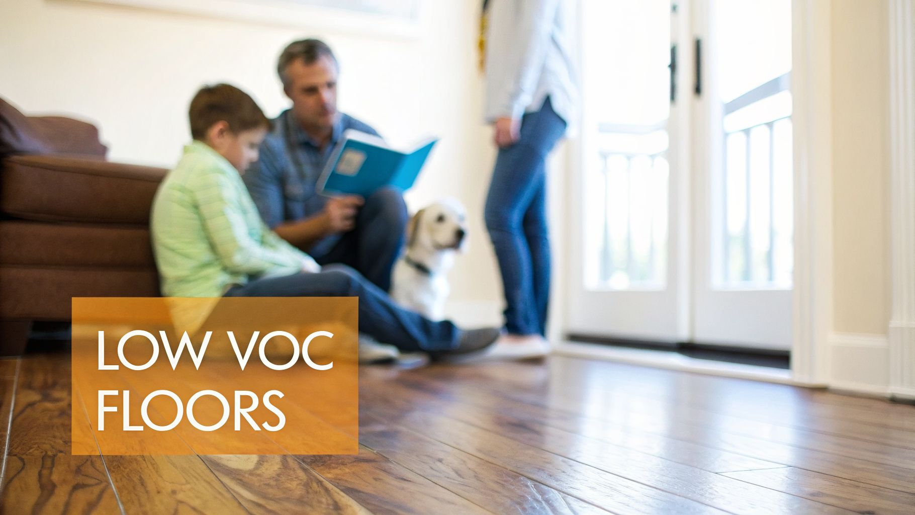 A family with a dog relaxes on a clean, low VOC hardwood floor in a sunlit home.