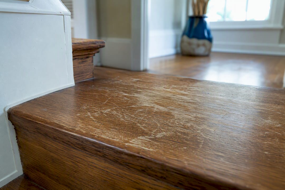 Close-up of worn solid hardwood stair tread